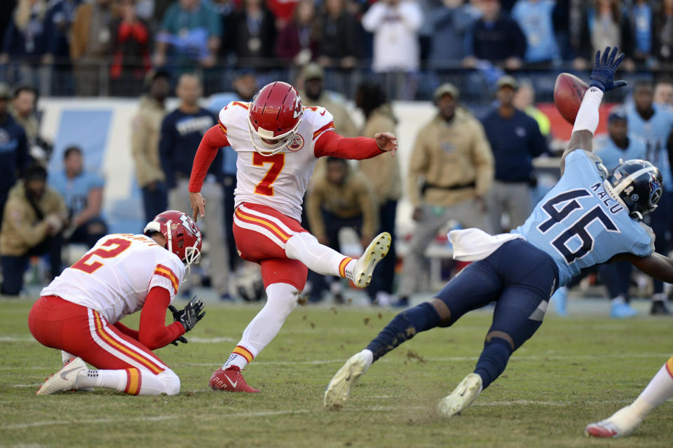 Tennessee Titans defensive back Joshua Kalu (46) blocks a 52-yard field goal attempt by Kansas City Chiefs kicker Harrison Butker (7) on the final play of an NFL football game Sunday, Nov. 10, 2019, in Nashville, Tenn. The Titans won 35-32. (AP Photo/Mark Zaleski)