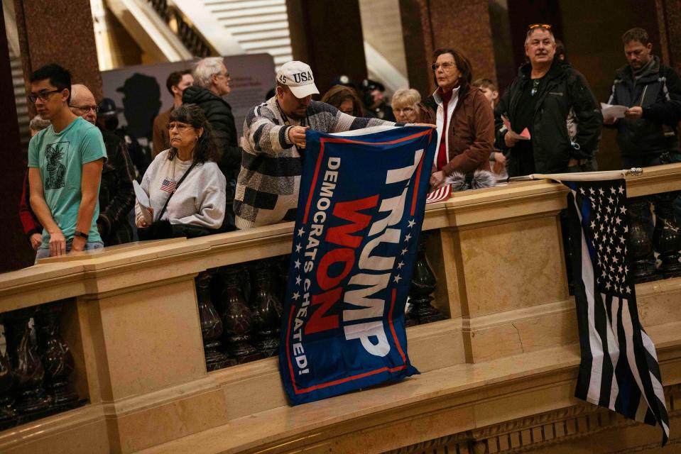 A rally calling for the decertification of the 2020 presidential election at the state Capitol in Madison, Wis., Feb. 15, 2022. More than 15 months after former President Donald Trump lost Wisconsin by 20,682 votes, a scheme to decertify the results of the 2020 presidential election in hopes of reinstalling Trump in the White House is dividing the stateÕs Republican Party. (Taylor Glascock/The New York Times)