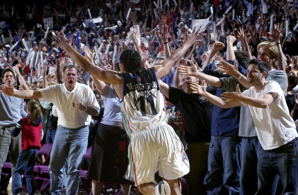 Teresa Weatherspoon is greeted by jubilant fans after the New York Liberty eliminated the Washington Mystics in the 2002 Eastern Conference finals at Madison Square Garden. (Photo by Andrew Savulich/NY Daily News Archive via Getty Images)
