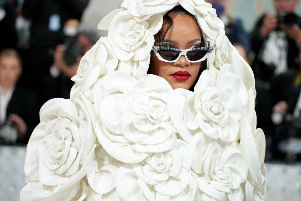 Rihanna wore a white Valentino gown when she walked the red carpet last year with her partner A$AP Rocky. FilmMagic