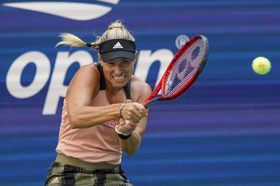 Angelique Kerber, of Germany, returns a shot to Anhelina Kalinina, of Ukraine, during the second round of the US Open tennis championships, Thursday, Sept. 2, 2021, in New York. (AP Photo/Elise Amendola)