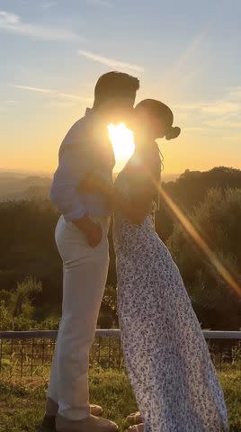 <p>Derek Hough/Instagram</p> Derek Hough and Hayley Erbert kiss on their honeymoon