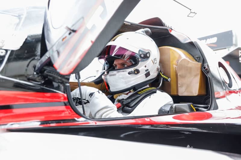 German motorsports racing driver Sebastian Vettel sits in a Porsche 963 during a Porsche Penske Motorsport endurance test in Spain. Four-time Formula One world champion Sebastian Vettel tested for Porsche on Tuesday in Spain as the German carmaker gears up for the Le Mans 24-hour. Porsche Handout/dpa