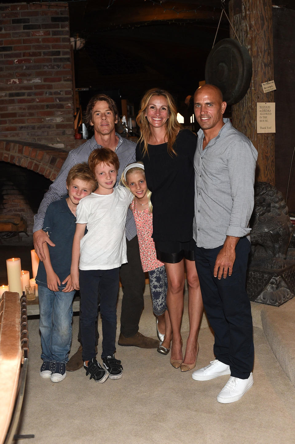 Daniel Moder, Julia Roberts, Kelly Slater, Phinnaeus Moder, Henry Daniel Moder and Hazel Moder attend Kelly Slater, John Moore and Friends Celebrate the Launch of Outerknown at Private Residence on August 29, 2015 in Malibu, California