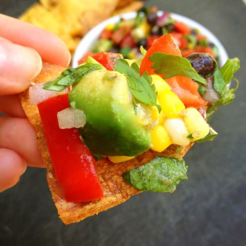 <p>The Lemon Bowl</p><p>This salsa brings a whole new meaning to chips and salsa. It's loaded with avocados, corn and black beans. <a href="http://thelemonbowl.com/2013/08/avocado-black-bean-and-red-pepper-salsa.html" rel="nofollow noopener" target="_blank" data-ylk="slk:Get the recipe HERE;elm:context_link;itc:0;sec:content-canvas" class="link ">Get the recipe HERE</a>. </p>