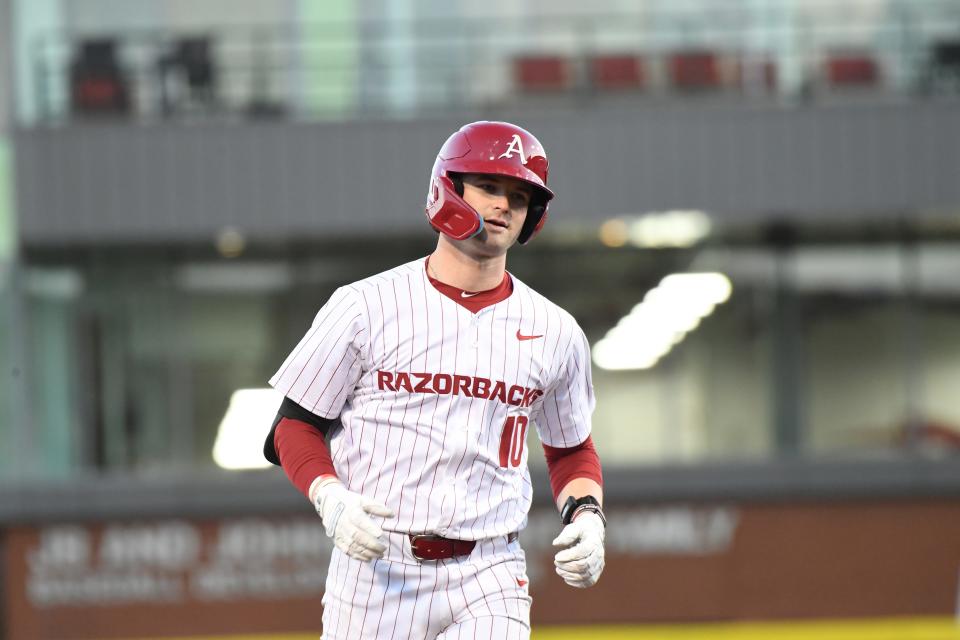 Arkansas baseball's Peyton Stovall rounds third after hitting his first home run of the season in an 11-1 win over Murray State on Saturday, March 9, 2024.