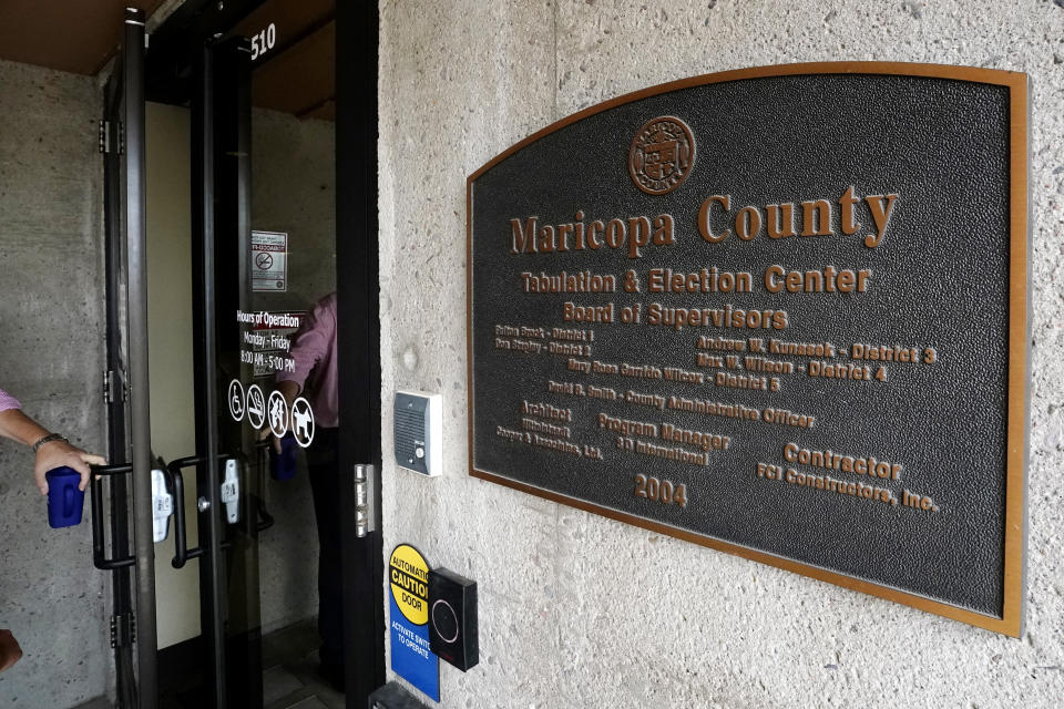 The main entrance at the Maricopa County Elections Department in Phoenix, Thursday, Sept. 8, 2022. Maricopa County election officials, like many others around the country, have begun pushing back against a flood of misinformation related to voting that often leads to public confusion and anger. (AP Photo/Ross D. Franklin)