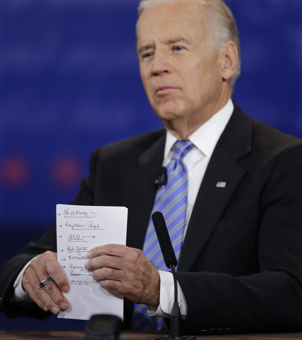 FILE - Then-Vice President Joe Biden holds up his notes during the vice presidential debate with Republican vice presidential candidate Rep. Paul Ryan, at Centre College, Oct. 11, 2012, in Danville, Ky. Biden is a man who writes down his thoughts. And some of those handwritten musings over his decades of public service are now a part of a special counsel's investigation into the handling of classified documents. It isn't clear yet what the investigators are looking for by taking the notes from his time as vice president and his years in the Senate, from his beach home in Rehoboth and his primary residence in Wilmington, Del. (AP Photo/David Goldman, File)