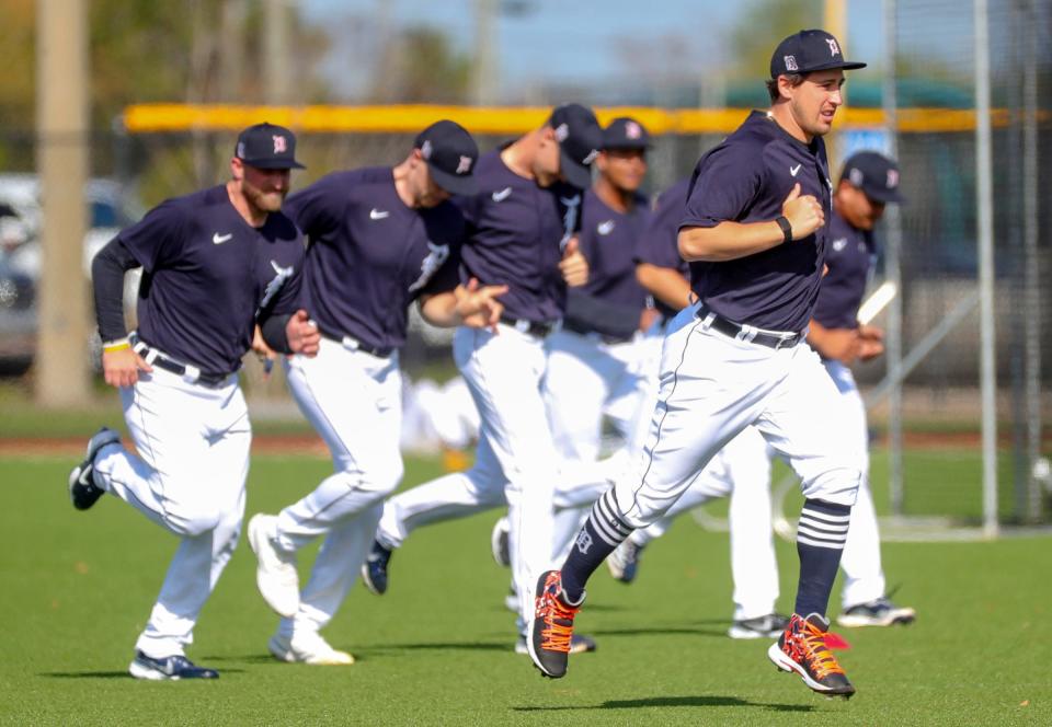 Detroit Tigers pitcher Derek Holland runs with teammates  during practice Monday, February 22, 2021 on the Tiger Town practice fields in Lakeland Florida.