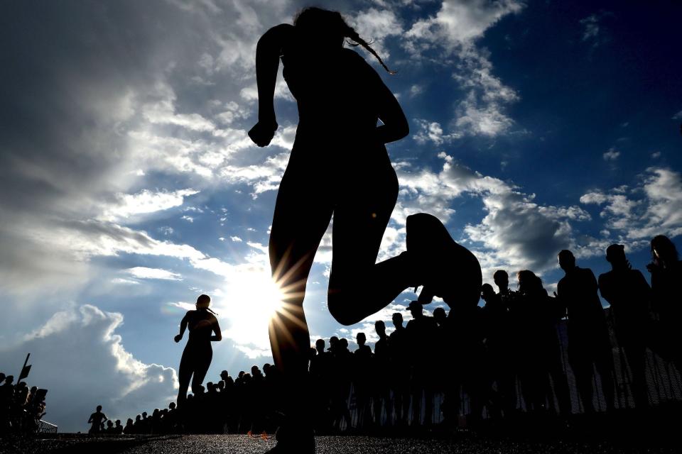 Athletes compete in the run stage of the Women's Elite Triathlon competition at the European Championships Munich 2022 in Germany.