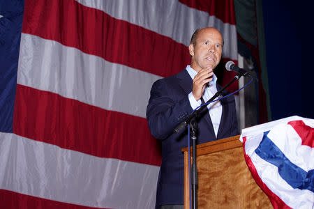 FILE PHOTO: U.S. Rep. John Delaney enters the stage before speaking at the Iowa Democratic Wing Ding in Clear Lake, Iowa, U.S., August 10, 2018. Picture taken August 10, 2018. REUTERS/KC McGinnis/File Photo