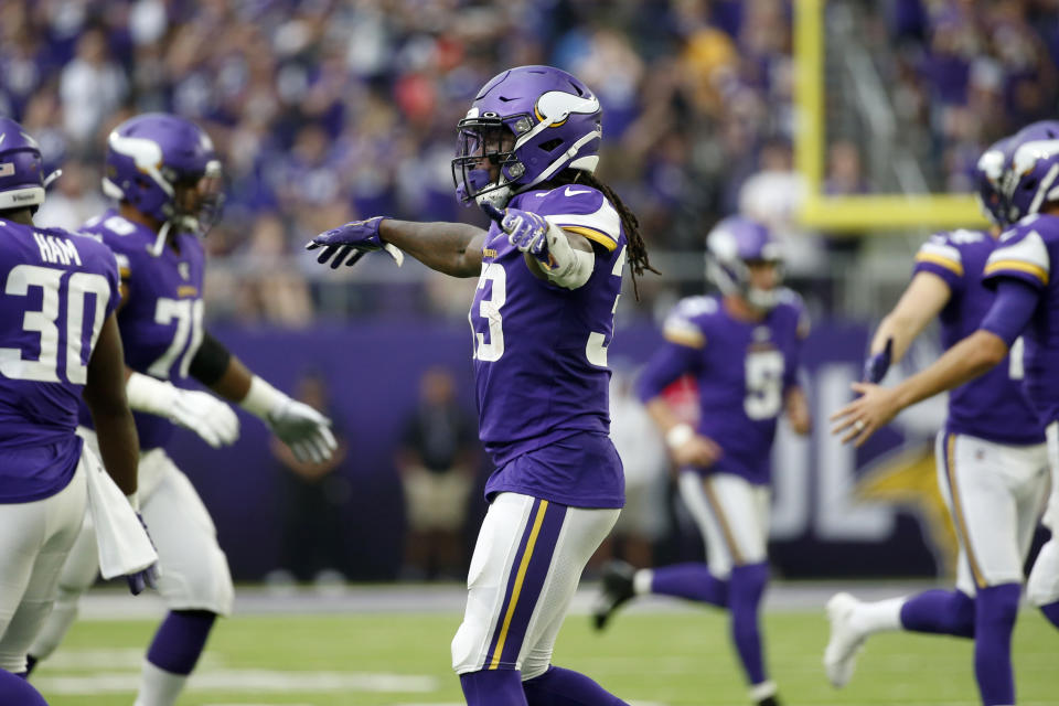 Minnesota Vikings running back Dalvin Cook (33) celebrates after scoring on a 1-yard touchdown run during the first half of an NFL football game against the Oakland Raiders, Sunday, Sept. 22, 2019, in Minneapolis. (AP Photo/Bruce Kluckhohn)