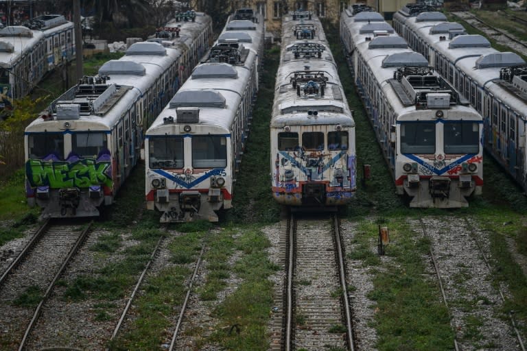 Scrap trains decorated with graffiti sit at Istanbul Haydarpasa railway station, where train services are set to resume in 2019