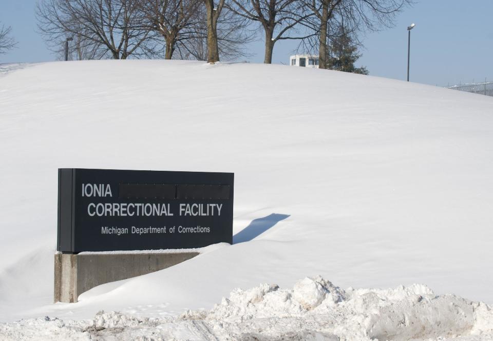 Snow blankets the Ionia Correctional Facility in Michigan Monday Feb. 3, 2014. A national manhunt is underway for convicted murderer Michael Elliot who escaped Sunday from the prison. (AP Photo/The Grand Rapids Press, Chris Clark) ALL LOCAL TV OUT; LOCAL TV INTERNET OUT