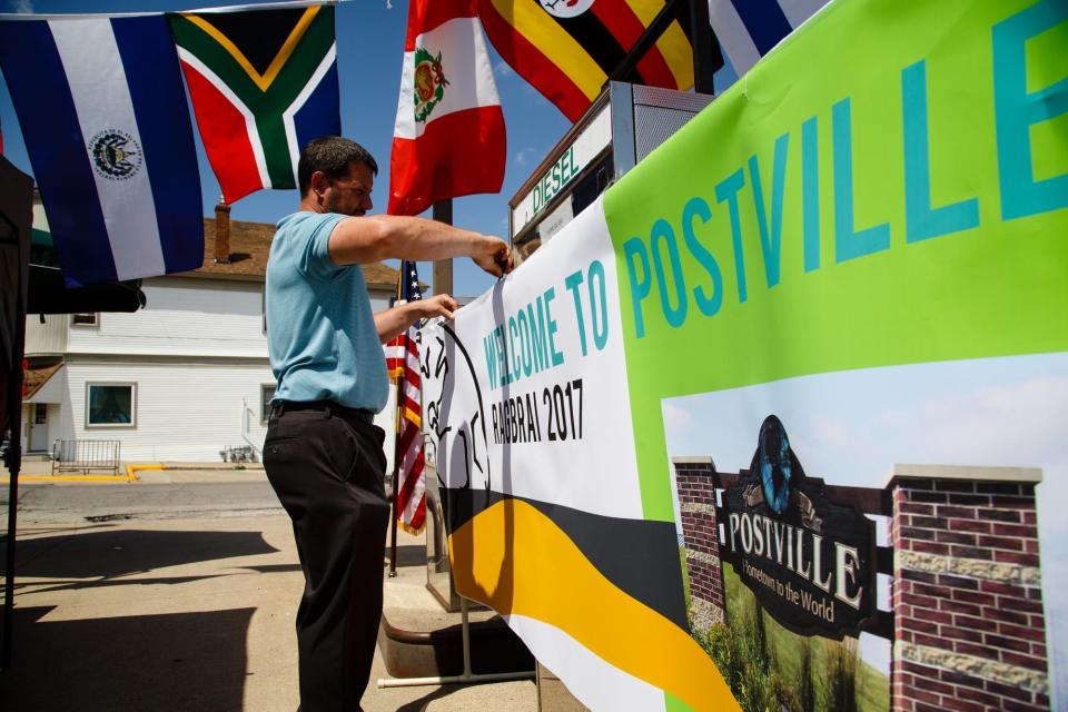 A sign welcomes cyclists on the RAGBRAI route inspection ride to Postville on  June 9, 2017.