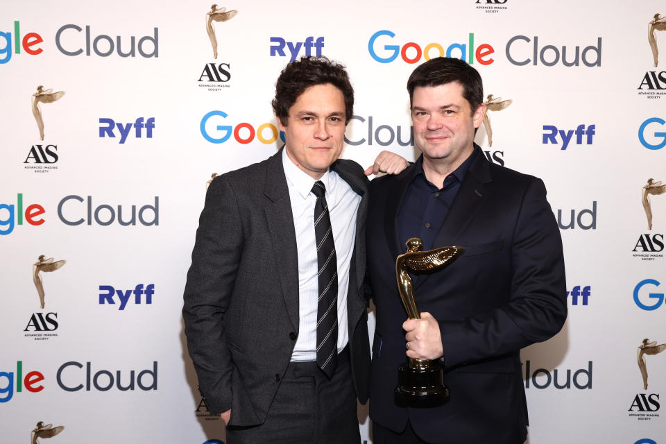 BEVERLY HILLS, CALIFORNIA - FEBRUARY 09: (L-R) Phil Lord and Chris Miller pose with the Best Feature - Animation Award for 'Spider-Man: Across the Spider-Verse' during the 14th Advanced Imaging Society's Lumiere Awards at The Beverly Hills Hotel on February 09, 2024 in Beverly Hills, California. (Photo by Tommaso Boddi/Getty Images for The Advanced Imaging Society)