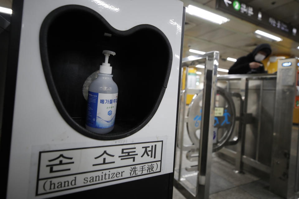 A bottle of hand sanitizer is placed in a subway station for public use to protect against the coronavirus in Seoul, South Korea, Sunday, Dec. 27, 2020. (AP Photo/Lee Jin-man)