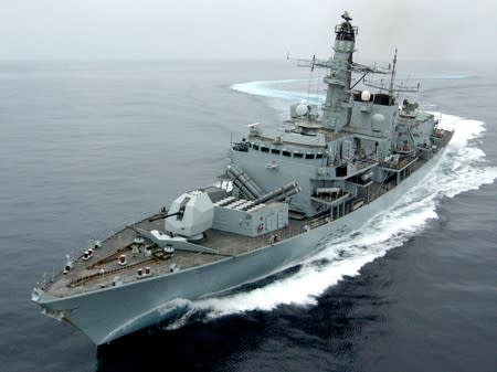 FILE PHOTO: Royal Navy Type 23 frigate HMS Montrose performs a series of tight turns off Oman