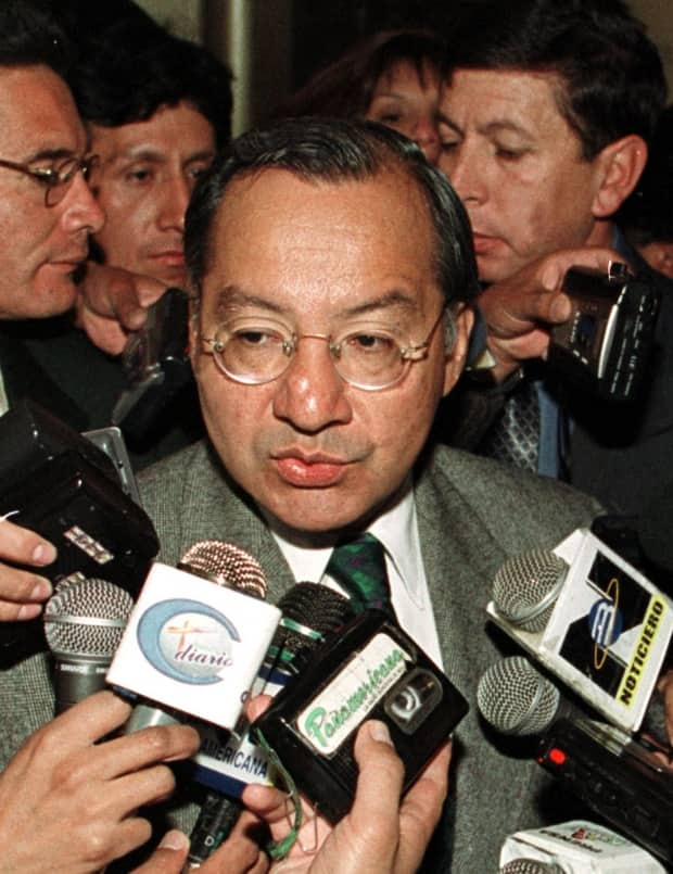 A file photo from July 2001 shows Victor Manuel Rocha speaking to members of the media, back when he was serving as the U.S. ambassador to Bolivia. In April 2024, Rocha was sentence to to 15 years in a U.S. federal prison after admitting he worked for decades as a secret agent for communist Cuba.