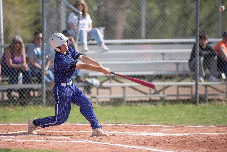 Rye High School's Will Hamler connects for a hit during a game against Monte Vista on Tuesday, April 30, 2024.