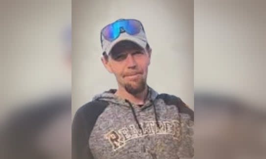 Adam Dickerson was a father, friend, skilled in mechanics and an outdoorsy person, his mother says.  (S.O. Mehan & Son Funeral Home - image credit)