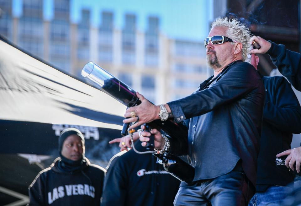 Guy Fieri shooting T-shirts at Guy Fieri's Flavortown Tailgate 2024