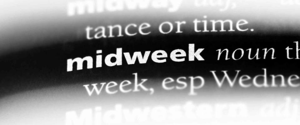midweek word in a dictionary. midweek concept.
