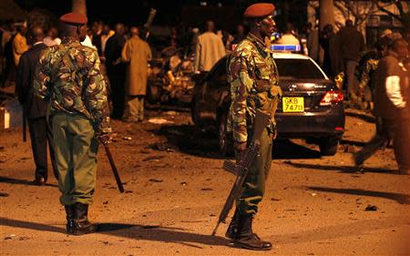 Kenyan police secure the scene of an explosion outside the Pangani police station in the capital Nairobi April 23, 2014. REUTERS/Thomas Mukoya