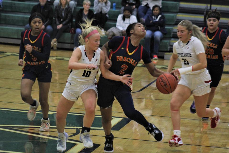 Purcell Marian's Dee Alexander (2) is the Southwest District's Division II Player of the Year.