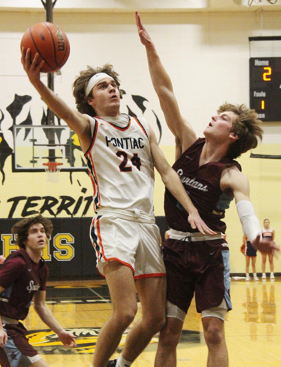 Pontiac junior Kerr Bauman attacks the basket against St. Joseph-Ogden in a semifinal matchup at the Class 2A Herscher Sectional Tuesday. Bauman scored 13 points in the fourth quarter to lead the eighth-ranked Indians to a 55-40 victory over the sixth-ranked Spartans. The win moves PTHS into its first sectional title game since 1969.