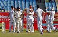 Cricket - India v England - First Test cricket match - Saurashtra Cricket Association Stadium, Rajkot, India - 11/11/16. England's Stuart Broad (C) celebrates taking India's Gautam Gambhir wicket. REUTERS/Amit Dave