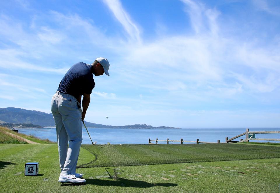 PEBBLE BEACH, CALIFORNIA - JUNE 10: Tiger Woods of the United States plays a shot from the seventh tee during a practice round prior to the 2019 U.S. Open at Pebble Beach Golf Links on June 10, 2019 in Pebble Beach, California. (Photo by Andrew Redington/Getty Images)