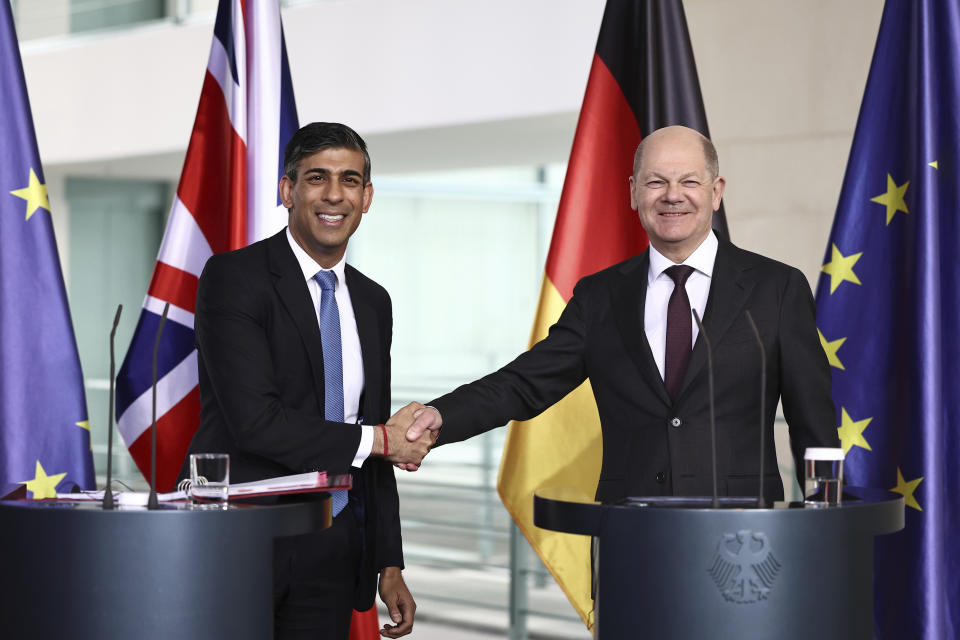 German Chancellor Olaf Scholz, right, and Britain's Prime Minister Rishi Sunak shake hands during a joint press conference at the Chancellery in Berlin, Wednesday April 24, 2024. (Henry Nicholls/Pool via AP)