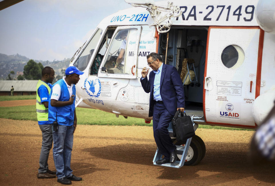 Director-General of the World Health Organization (WHO), Tedros Adhanom Ghebreyesus arrives by helicopter at Ruhenda airport in Butembo, to visit operations aimed at preventing the spread of Ebola and treating its victims, in eastern Congo Saturday, June 15, 2019. The World Health Organization on Friday said the Ebola outbreak is an "extraordinary event" of deep concern but does not yet merit being declared a global emergency, a declaration that typically triggers more funding, resources and political attention. (AP Photo/Al-hadji Kudra Maliro)