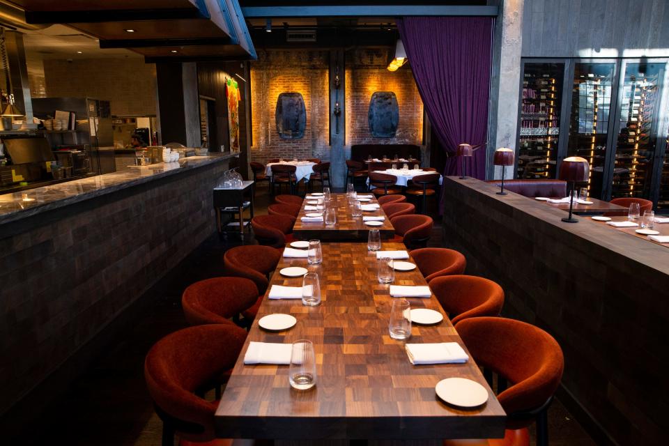 A seating area and a portion of the kitchen can be seen at Amelia Gene’s in Downtown Memphis, on Thursday, October 19, 2023.