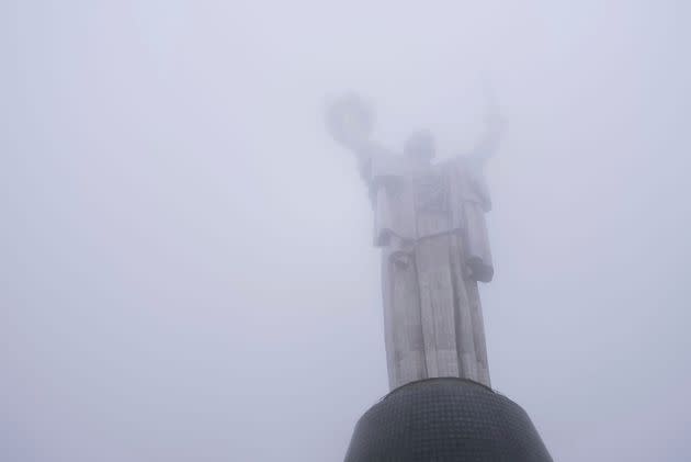 The Motherland Monument, which recently reopened for public viewing, is seen through fog in Kyiv, Ukraine, on Saturday.