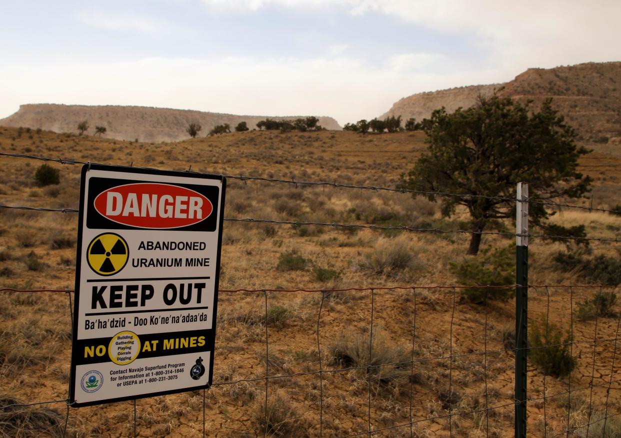 A warning sign about an abandoned uranium mine on the Navajo Nation is posted next to the Red Water Pond Road, an area located north of Church Rock.