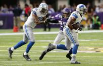 <p>Detroit Lions running back Theo Riddick (25) gets a block from teammate Eric Ebron (85) as he runs from Minnesota Vikings free safety Harrison Smith (22) during the first half of an NFL football game Sunday, Nov. 6, 2016, in Minneapolis. (AP Photo/Jim Mone) </p>