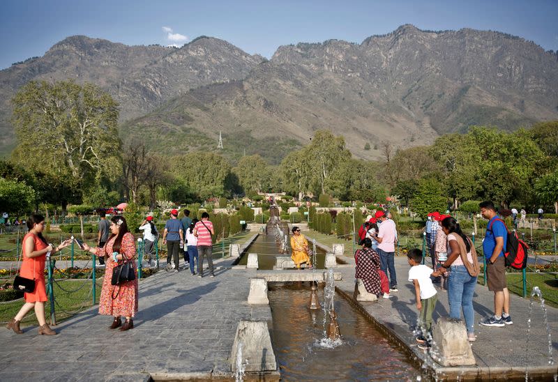 Tourists visit Nishat Garden in Srinagar