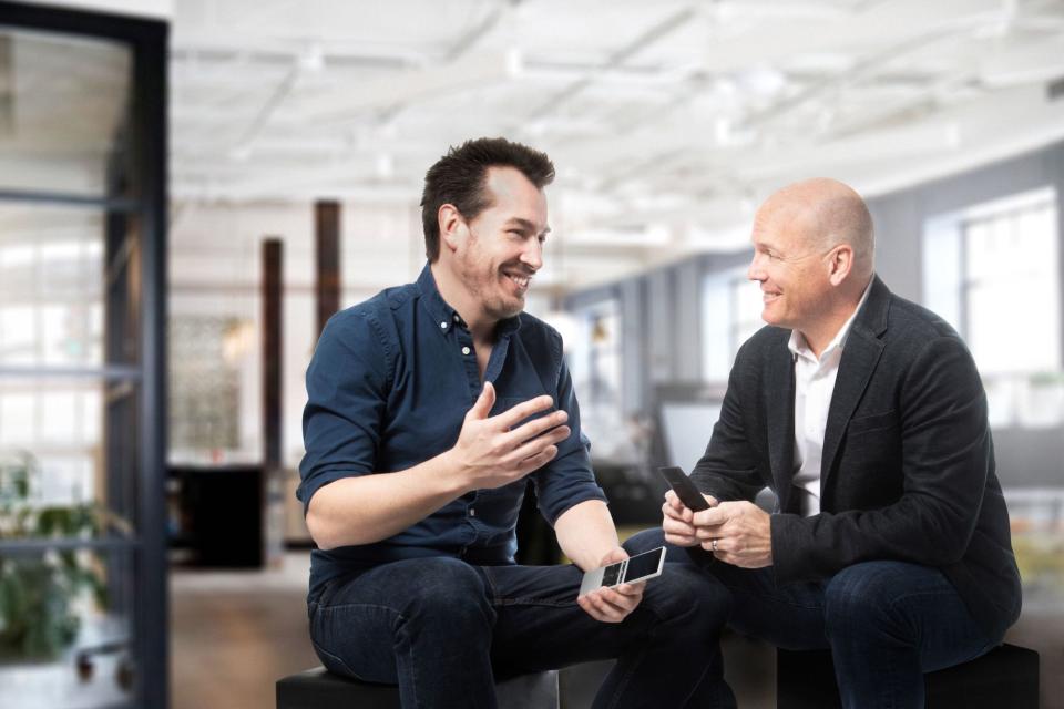 Raphael Oberholzer and Charlie Kindel sitting and talking