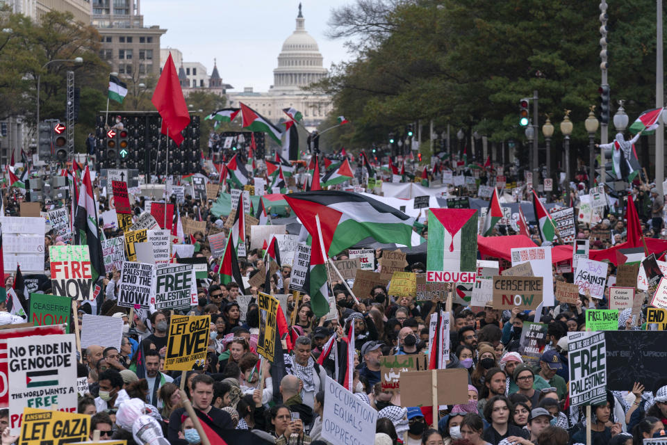 FILE - With the U.S Capitol n the background thousands of protesters rally during a pro-Palestinian demonstration at Freedom Plaza in Washington, Saturday, Nov. 4, 2023. As the Israel-Hamas war rages in Gaza, there's a bitter battle for public opinion flaring in the U.S., with angry rallies and disruptive protests at prominent venues in several major cities. Among the catalysts are Palestinian and Jewish-led groups that have been active for years in opposing Israeli policies toward the Palestinians. Now many groups involved in those earlier efforts are playing a key role protesting the latest fighting, with actions on campuses and beyond. (AP Photo/Jose Luis Magana, File)