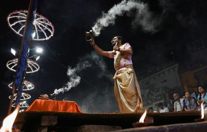 Spectators gather to watch the nightly "Ganga Aarti" prayer in Varanasi