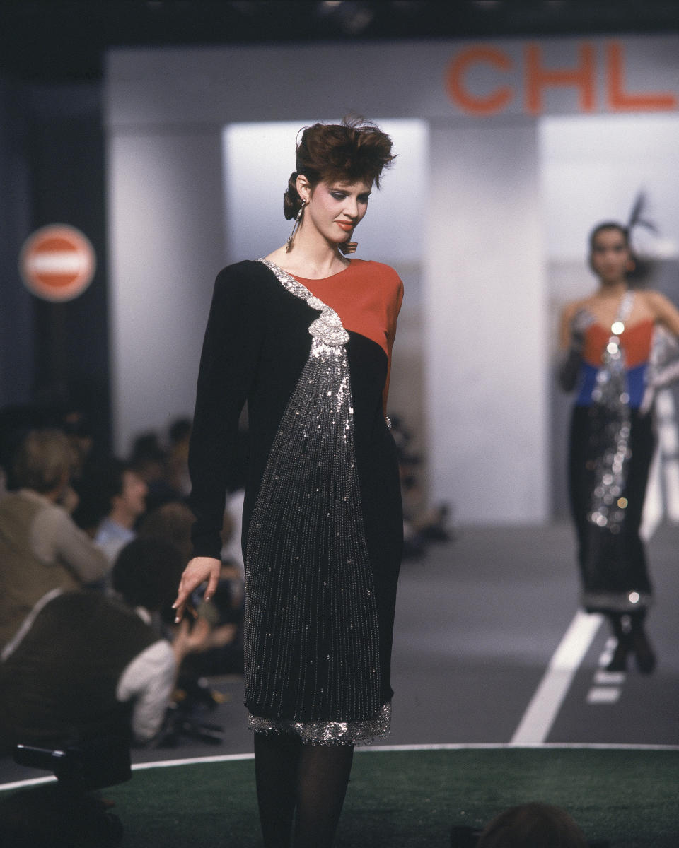 Model on the runway of Karl Lagerfeld's Fall 1983 Ready-To-Wear collection for Chloe on March 21, 1983 in Paris, France