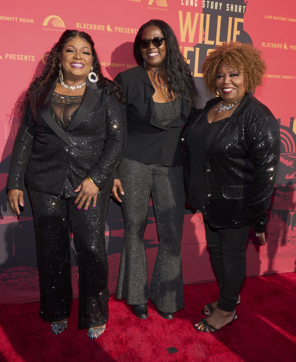 Regina McCrary, from left, Alfreda McCrary and Ann McCrary of The McCrary Sisters arrive at Willie Nelson 90, celebrating the singer's 90th birthday on Saturday, April 29, 2023, at the Hollywood Bowl in Los Angeles. (Photo by Allison Dinner/Invision/AP)