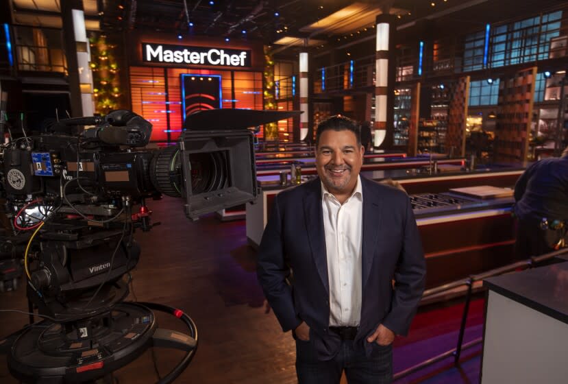 VAN NUYS, CA - OCTOBER 29, 2021: Cris Abrego, the CEO of Endemol Shine Americas, a big reality show production firm, is photographed on the set of one of his shows, MasterChef, at Occidental Studios in Van Nuys. Abrego is one of the few Latinos from (east of) East Los Angeles, who has successfully climbed the corporate ladder in Hollywood. (Mel Melcon / Los Angeles Times)