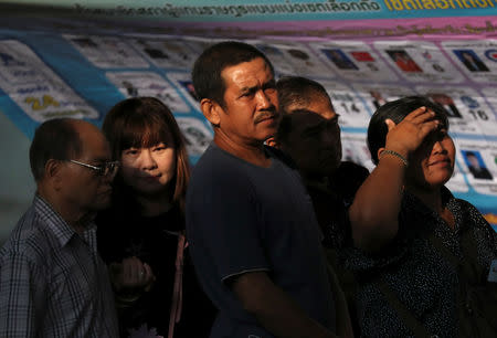 People queue up to vote at a polling station during the general election in Bangkok, Thailand, March 24, 2019. REUTERS/Athit Perawongmetha