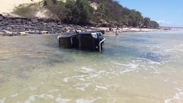 The Australian beach that 'swallows' cars