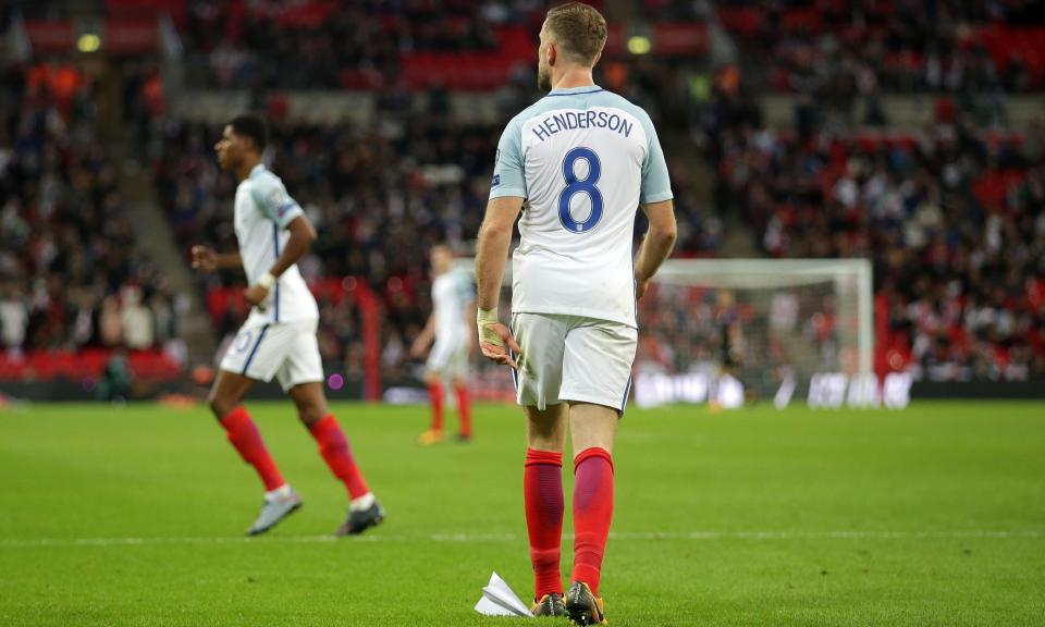 Plane to see: Jordan Henderson struggled to help England going forward against Slovakia at Wembley last night as the fans made their frustration known