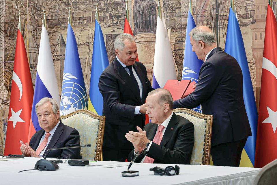 FILE - In this handout photo released by Russian Defense Ministry Press Service, Turkish President Recep Tayyip Erdogan, right, and U.N. Secretary General, Antonio Guterres, sit as Russian Defense Minister Sergei Shoigu, top left, and Turkish Defense Minister Hulusi Akar, top right, exchange documents during a signing ceremony at Dolmabahce Palace in Istanbul, Turkey, Friday, July 22, 2022. Ukrainian President Volodymyr Zelenskyy on Thursday, Aug. 18, 2022 is set to host his Turkish counterpart and the U.N. chief for talks about the implementation of a deal to resume Ukraine grain exports, the volatile situation at a Russia-occupied nuclear power plant and diplomatic efforts to help end the war. (Vadim Savitsky, Russian Defense Ministry Press Service via AP, File)