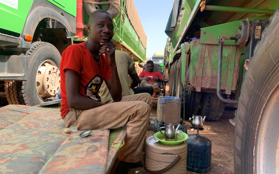 Malian trucks parked in Tingrela after the closure of the border between Ivory Coast and Mali - ANGE ABOA /REUTERS 